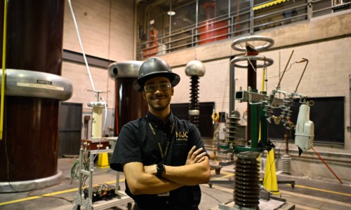 John Febus standing in a laboratory